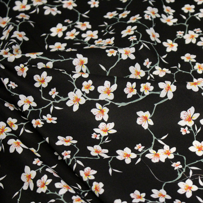 Tissu coton noir aux fleurs d'amandier - OEKO-TEX