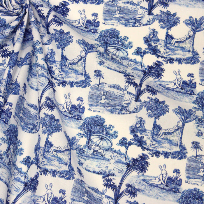 Tissu Toile de jouy de coton aux motifs Lapinous coquins bleus