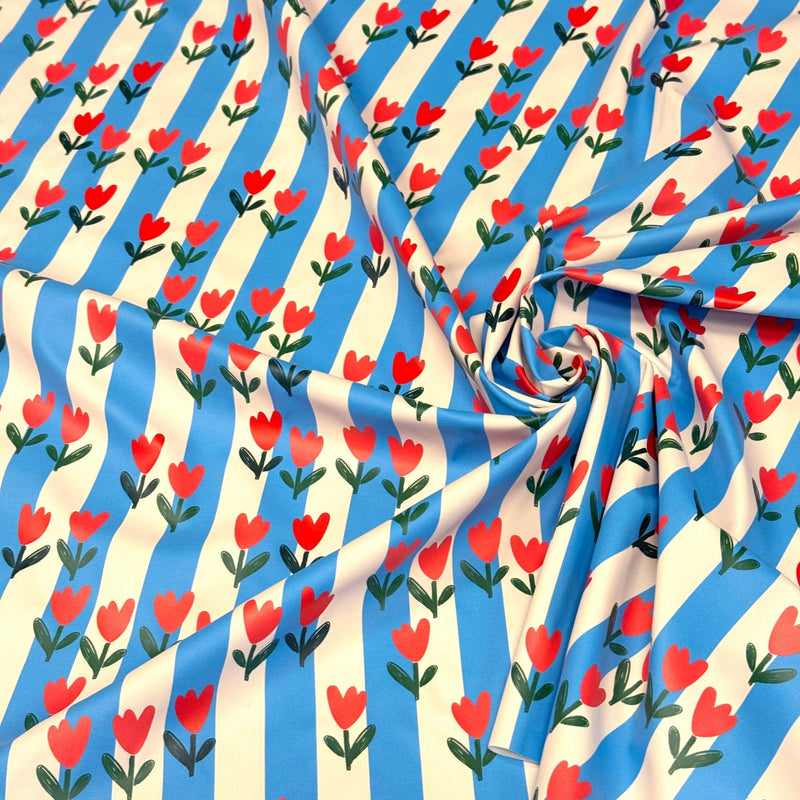 Tissu habillement imperméable, Rayures bleues & tulipes roses rouges - STANDARD 100 by OEKO-TEX - TissusPapi.com