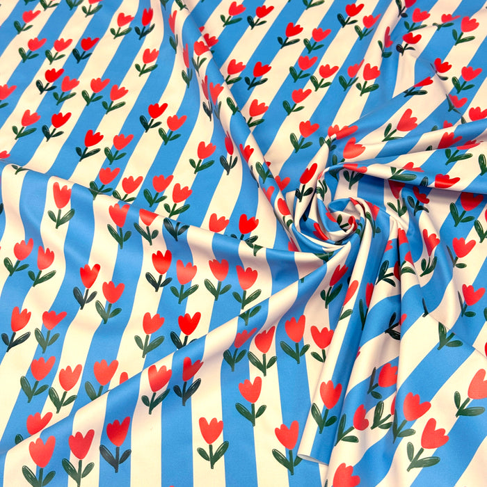 Tissu habillement imperméable, Rayures bleues & tulipes roses rouges - STANDARD 100 by OEKO-TEX