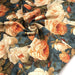 Tissu gabardine coton imprimée floral aux roses oranges et corail, fond bleu canard faux - uni - TissusPapi.com