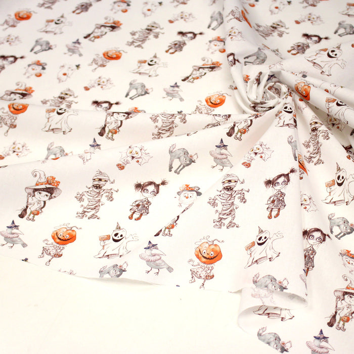 Tissu cotonnade HALLOWEEN, blanc aux personnages qui font peur, de fantomes et de momies