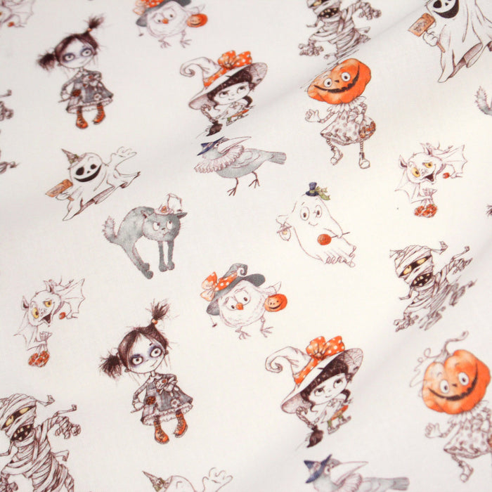 Tissu cotonnade HALLOWEEN, blanc aux personnages qui font peur, de fantomes et de momies