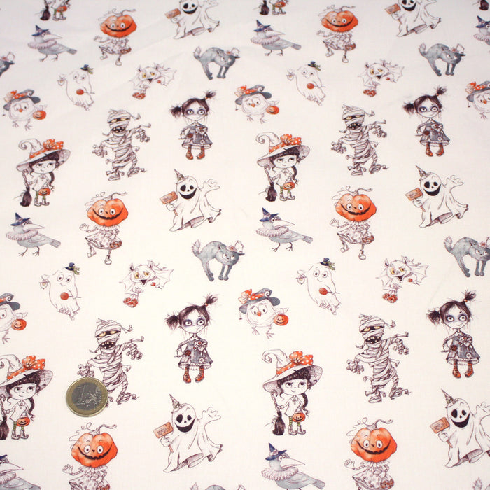 Tissu cotonnade HALLOWEEN, blanc aux personnages qui font peur, de fantomes et de momies