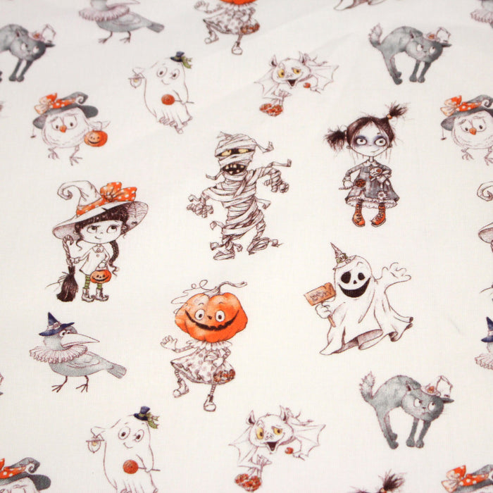 Tissu cotonnade HALLOWEEN, blanc aux personnages qui font peur, de fantomes et de momies