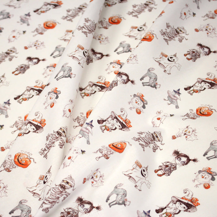 Tissu cotonnade HALLOWEEN, blanc aux personnages qui font peur, de fantomes et de momies