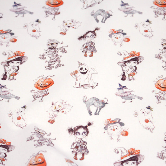 Tissu cotonnade HALLOWEEN, blanc aux personnages qui font peur, de fantomes et de momies