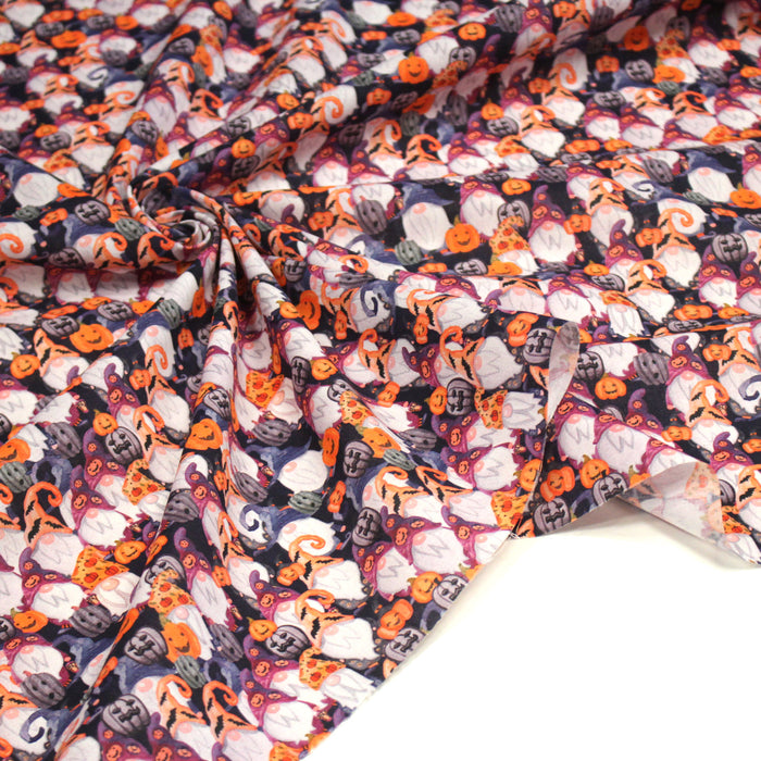 Tissu cotonnade HALLOWEEN aux têtes de citrouille multicolores