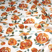 Tissu gabardine coton imprimée blanc aux roses oranges façon aquarelle - TissusPapi.com