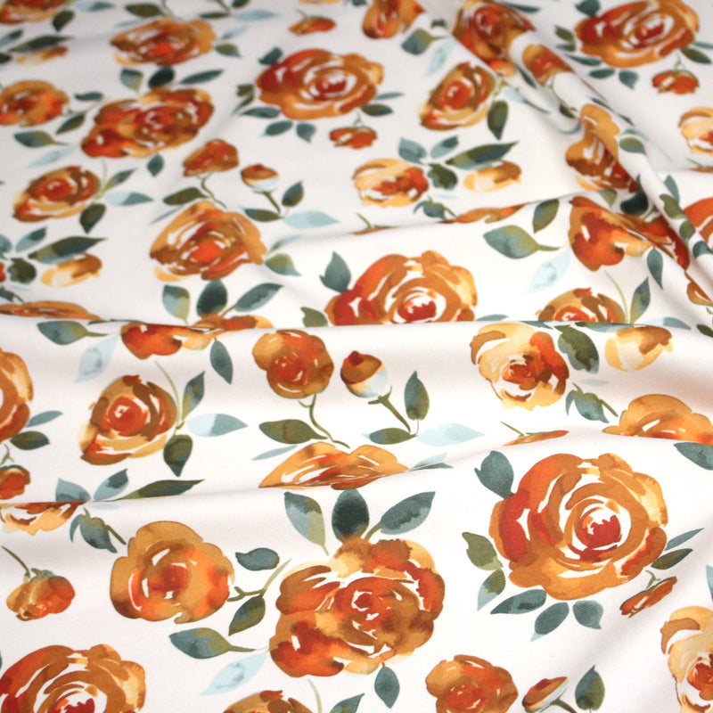 Tissu gabardine coton imprimée blanc aux roses oranges façon aquarelle - TissusPapi.com