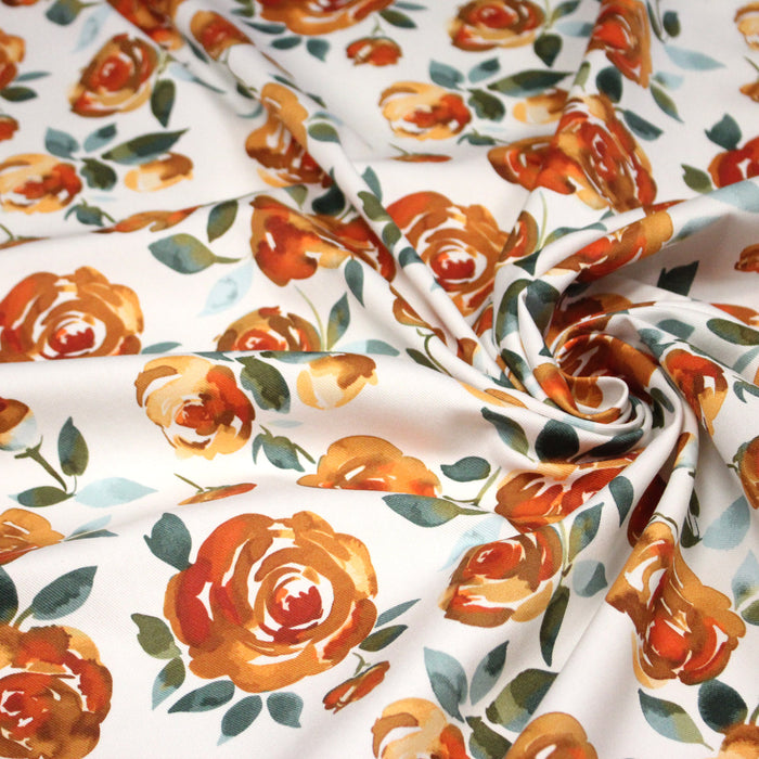 Tissu gabardine coton imprimée blanc aux roses oranges façon aquarelle - TissusPapi.com