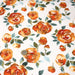 Tissu gabardine coton imprimée blanc aux roses oranges façon aquarelle - TissusPapi.com