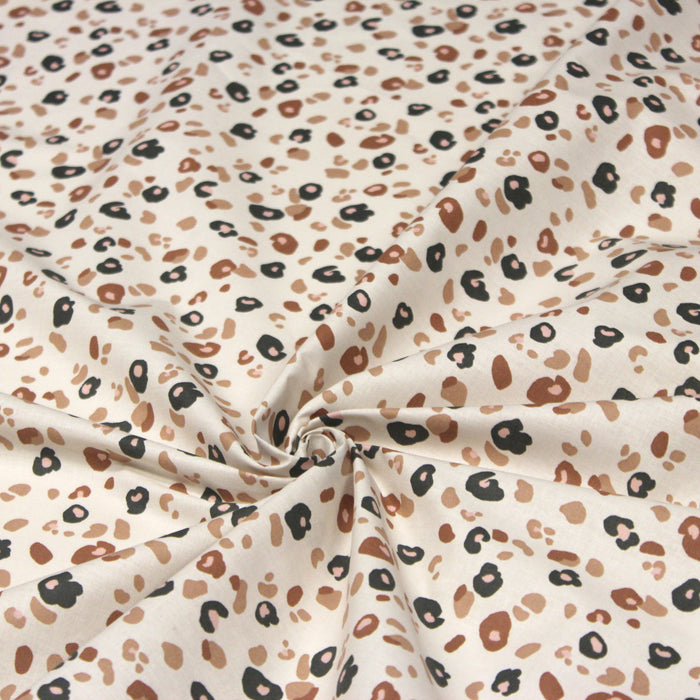 Tissu de coton Léopard, écru et tâches léopard noires, roses, ocres - OEKO-TEX