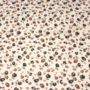 Tissu cotonnade LEOPARD, écru et taches léopard noires, roses, ocres - OEKO - TEX STANDARD 100 - TissusPapi.com