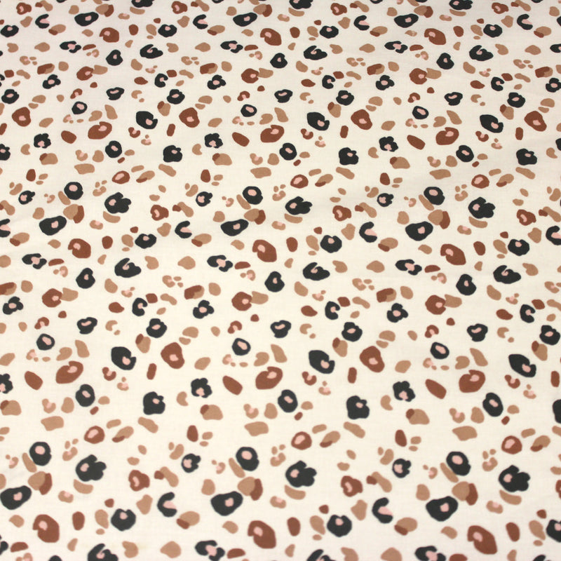 Tissu cotonnade LEOPARD, écru et taches léopard noires, roses, ocres - OEKO - TEX STANDARD 100 - TissusPapi.com