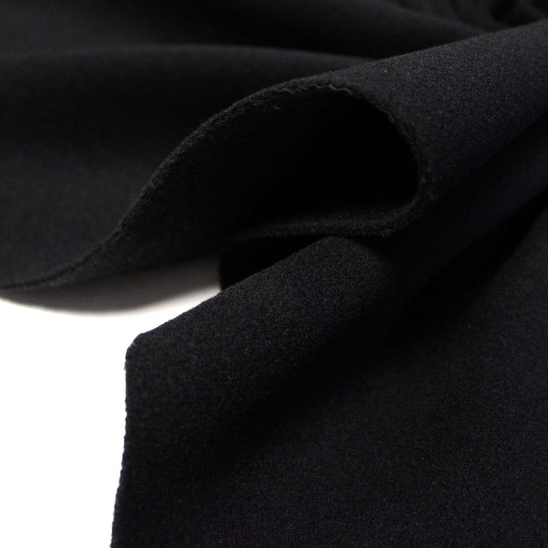 Tissu lainage épais et souple, noir uni, fabrication italienne