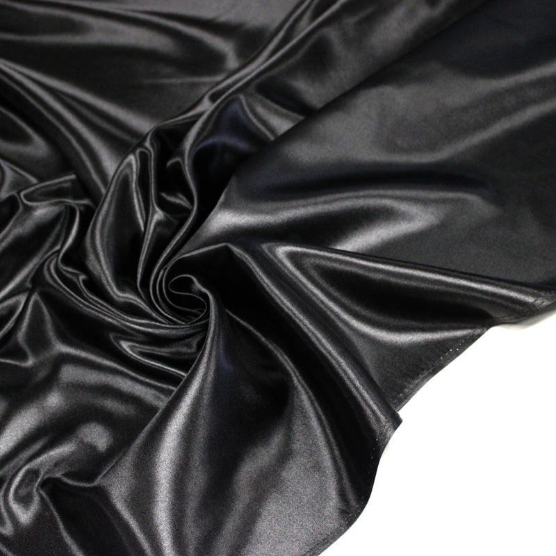 Tissu satin polyester noir uni, fabrication italienne