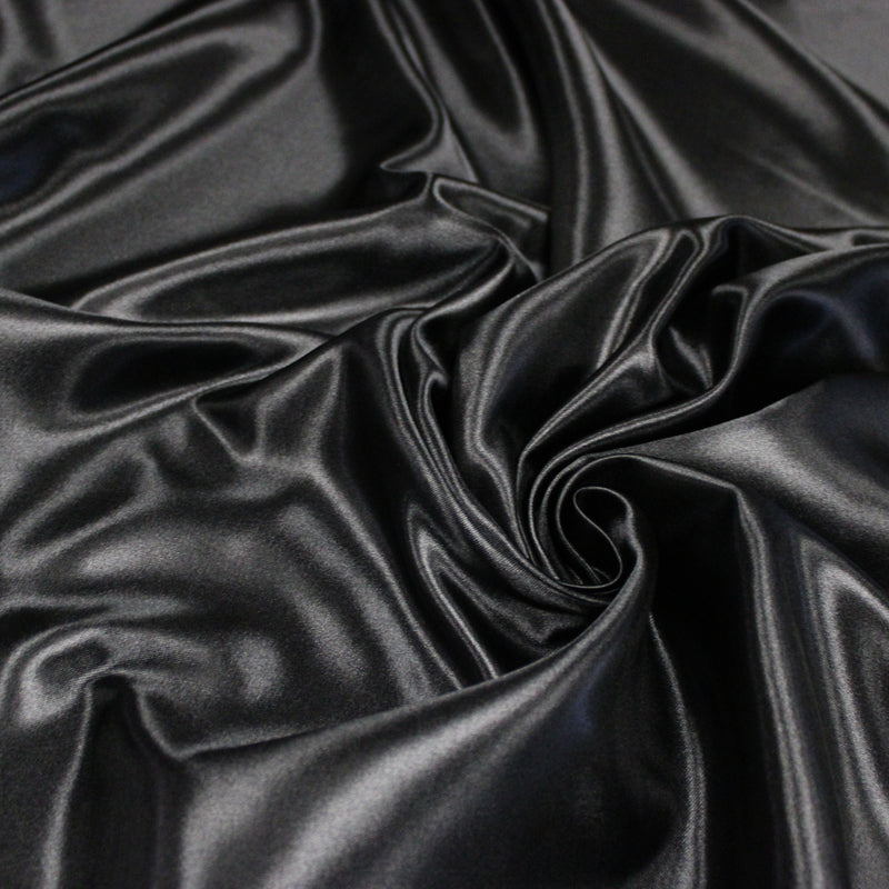 Tissu satin polyester noir uni, fabrication italienne
