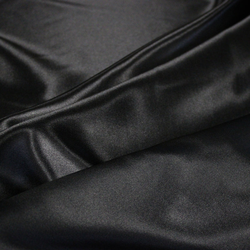 Tissu satin polyester noir uni, fabrication italienne