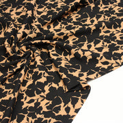 Tissu viscose fluide ocre aux feuilles noires façon silhouette - OEKO-TEX STANDARD 100 - TissusPapi.com