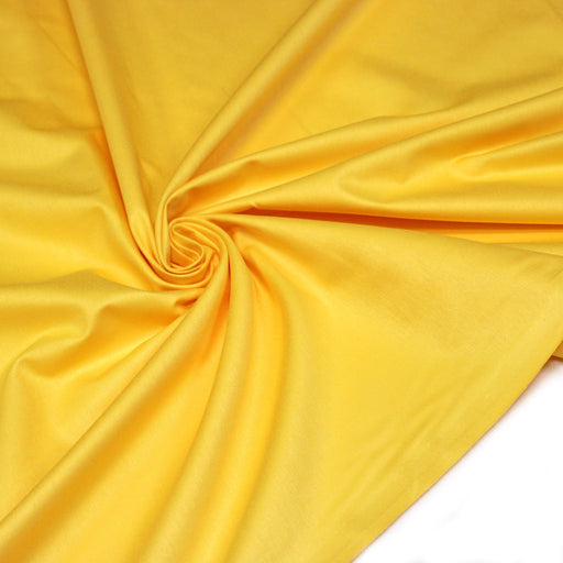 Tissu cotonnade jaune bouton d'or uni - COLLECTION LES BASIQUES - TissusPapi.com