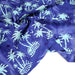 Tissu coton BATIK aux palmiers bleu ciel, fond bleu roi - MADE IN INDIA - TissusPapi.com