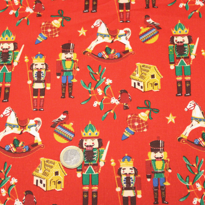 Tissu cotonnade de NOËL – Casse-noisettes et jouets d’antan, fond rouge - OEKO-TEX STANDARD 100