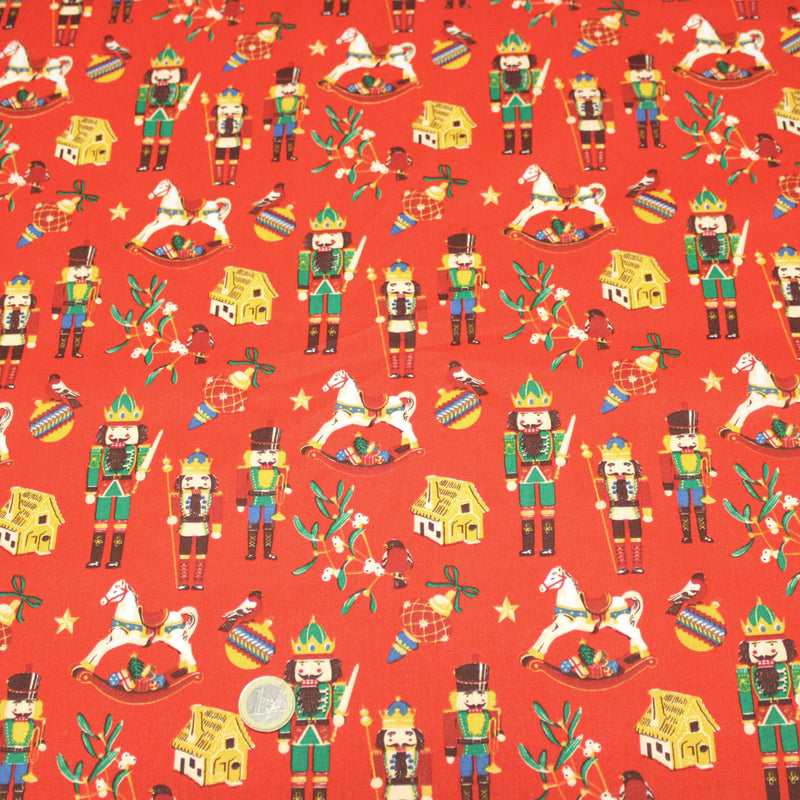 Tissu cotonnade de NOËL – Casse-noisettes et jouets d’antan, fond rouge - OEKO-TEX STANDARD 100