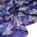 Tissu cotonnade BATIK aux papillons blanc : rose, vert, violet - MADE IN INDIA - TissusPapi.com
