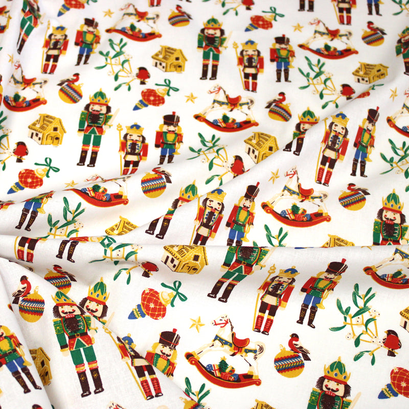 Tissu cotonnade de NOËL – Casse-noisettes et jouets d’antan, fond blanc - OEKO-TEX STANDARD 100