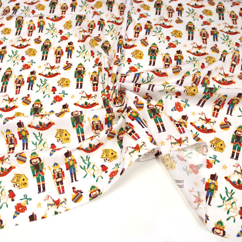 Tissu cotonnade de NOËL – Casse-noisettes et jouets d’antan, fond blanc - OEKO-TEX STANDARD 100