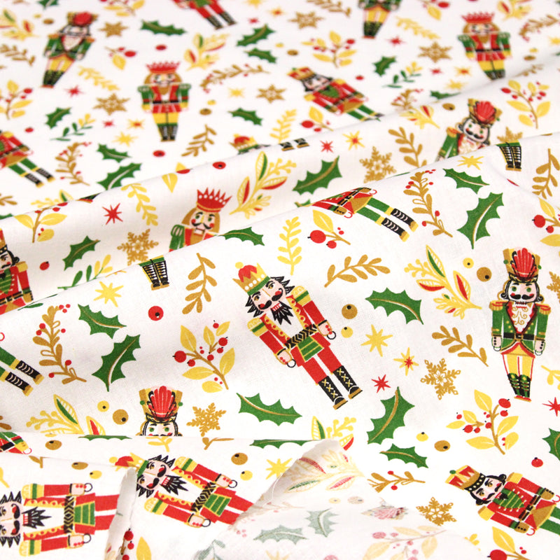Tissu cotonnade de NOËL, Casse-noisettes, houx et feuillages ocres, fond blanc - OEKO-TEX STANDARD 100
