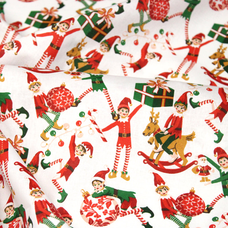 Tissu cotonnade de NOËL – La farandole des lutins, fond blanc - OEKO-TEX STANDARD 100
