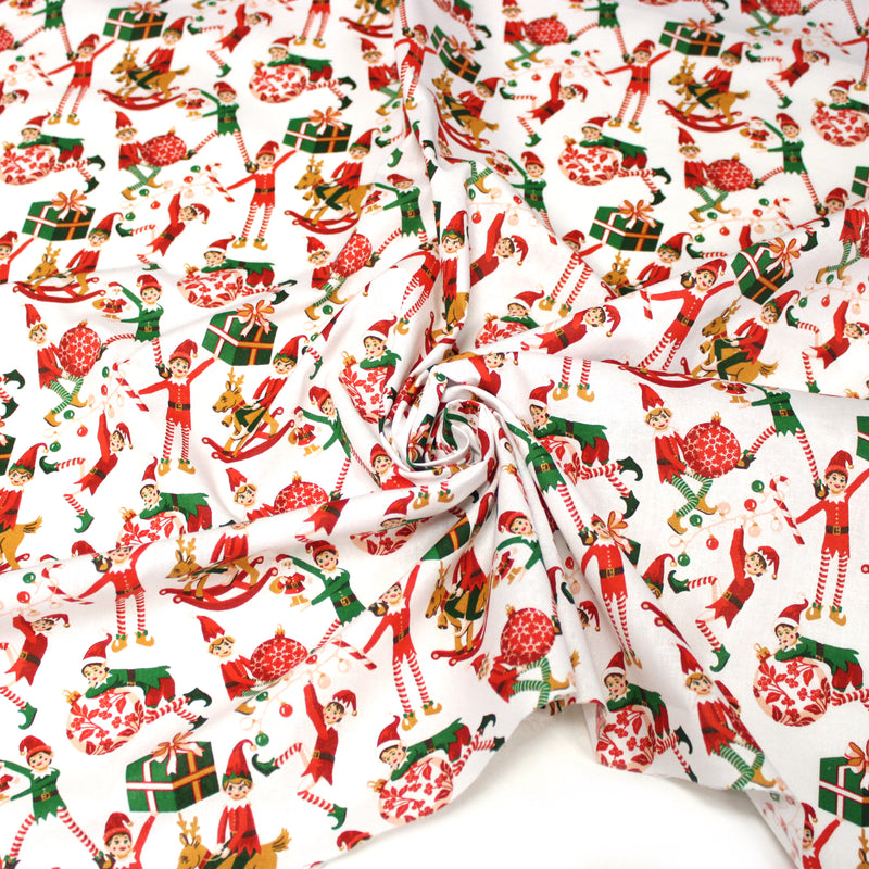 Tissu cotonnade de NOËL – La farandole des lutins, fond blanc - OEKO-TEX STANDARD 100