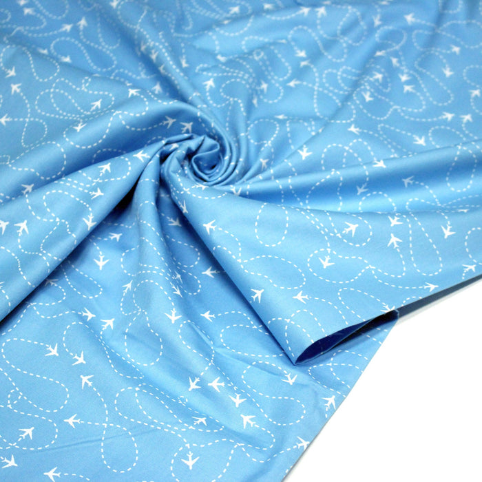 Tissu popeline coton bleu aux avions et lignes de vol, collection VOYAGE - TissusPapi.com