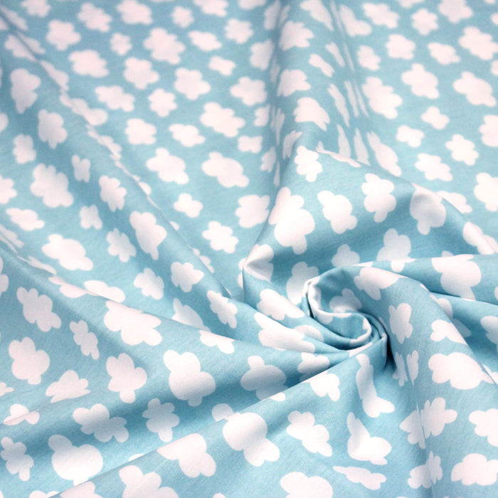 Tissu popeline coton bleu ciel aux nuages blanc, collection VOYAGE - TissusPapi.com