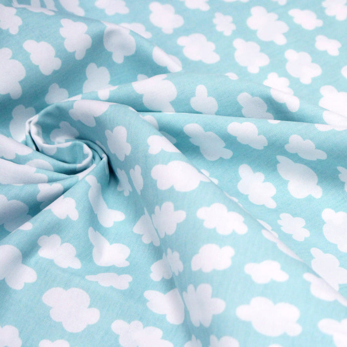 Tissu popeline coton bleu ciel aux nuages blanc, collection VOYAGE - TissusPapi.com