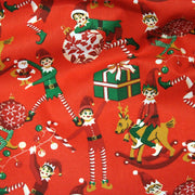 Tissu cotonnade de NOËL – La farandole des lutins, fond rouge - OEKO-TEX STANDARD 100 - TissusPapi.com
