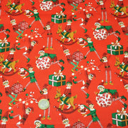 Tissu cotonnade de NOËL – La farandole des lutins, fond rouge - OEKO-TEX STANDARD 100 - TissusPapi.com