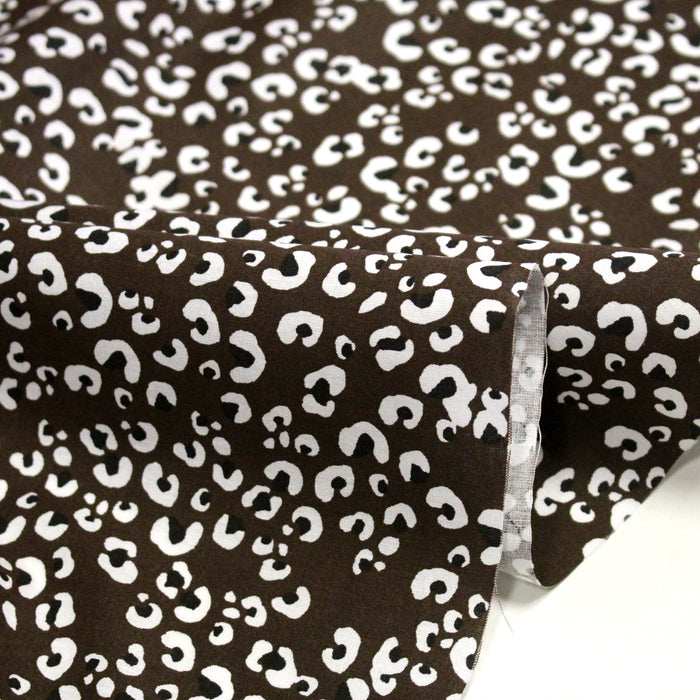 Tissu cotonnade LEOPARD, chocolat aux taches noires et blanches - OEKO-TEX