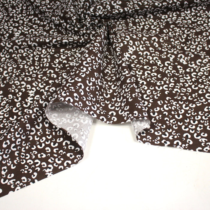 Tissu cotonnade LEOPARD, chocolat aux taches noires et blanches - OEKO-TEX