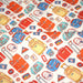 Tissu popeline coton Les valises et sacs à dos multicolores, collection VOYAGE - TissusPapi.com