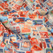 Tissu popeline coton, les autocollants de voyages, tons orange et bleus - TissusPapi.com
