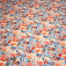 Tissu popeline coton, les autocollants de voyages, tons orange et bleus - TissusPapi.com