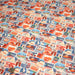Tissu popeline coton, les autocollants de voyages, tons orange et bleus - TissusPapi.com
