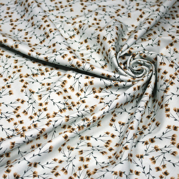 Tissu popeline coton, bleu ciel aux fines fleurs ocre et tiges vertes - Collection britannique - TissusPapi.com