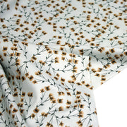 Tissu popeline coton, bleu ciel aux fines fleurs ocre et tiges vertes - Collection britannique - TissusPapi.com