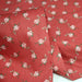 Tissu popeline coton fines fleurs roses sur fines rayures rouges et roses - Collection britannique - TissusPapi.com