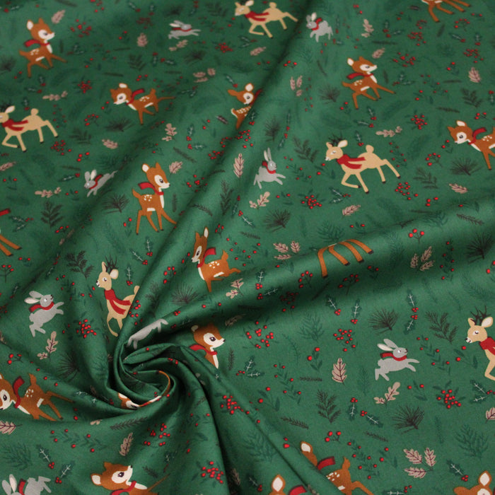 Tissu de coton de Noël vert aux faons Bambi, lapins, rennes et feuilles de houx - COLLECTION NOËL - OEKO-TEX