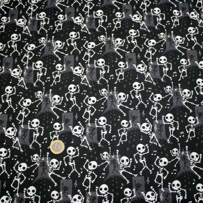 Tissu coton noir aux squelettes blancs - Collection Halloween - OEKO-TEX